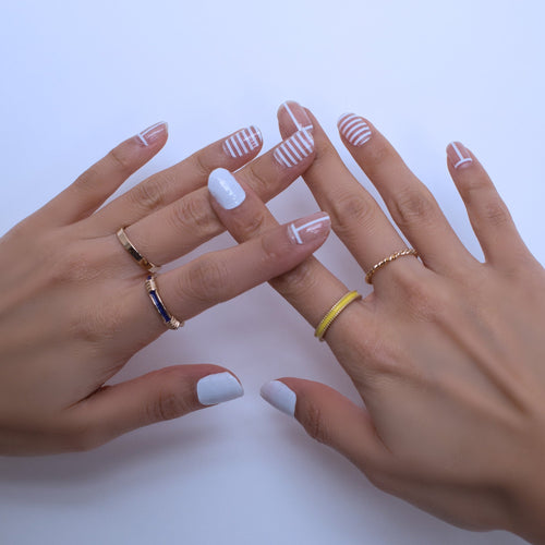 All about strips. This set is very simple. It can be used alone or used it as an overlay. It also provides white nail design on certain fingers to add in some diversity.  What’s special: Overlay or wear it alone