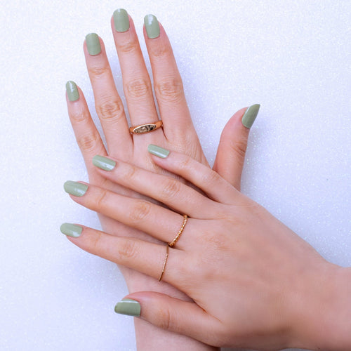 This set is not too dark or tropical. This olive green is earthy and pastel. It’s suitable for any season and all skin tones.