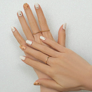 This set combines soft ivory and peachy hues with glitter gold stars. The gold foil on the soft colour brings more characters to the design. Keep dazzling with this fabulous set.  